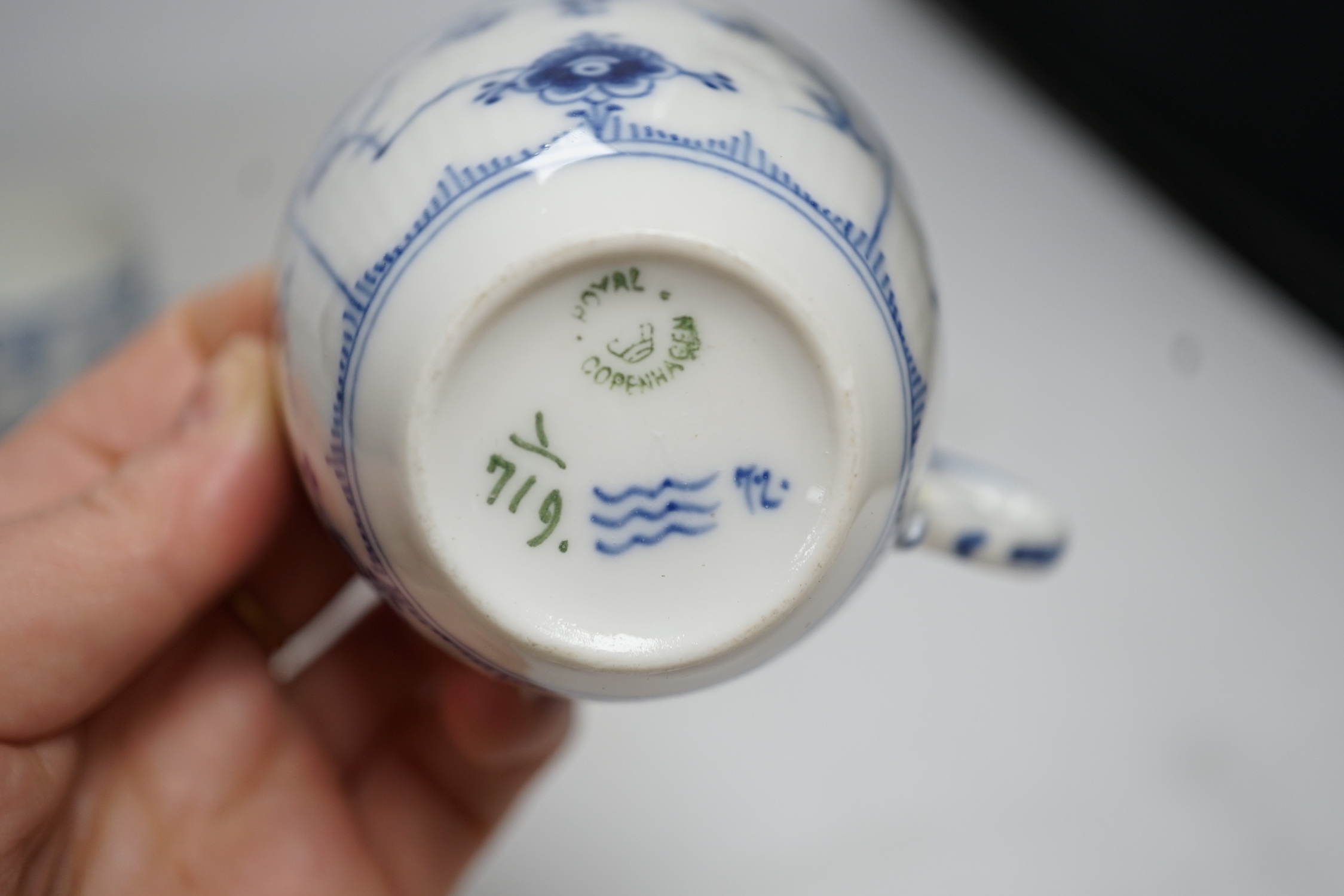 A Royal Copenhagen blue and white ‘onion pattern’ coffee and part set comprising; seven coffee cups with eight saucers, two teacup and saucers, and six tea plates together with a set of six similar Bavaria tea plates
